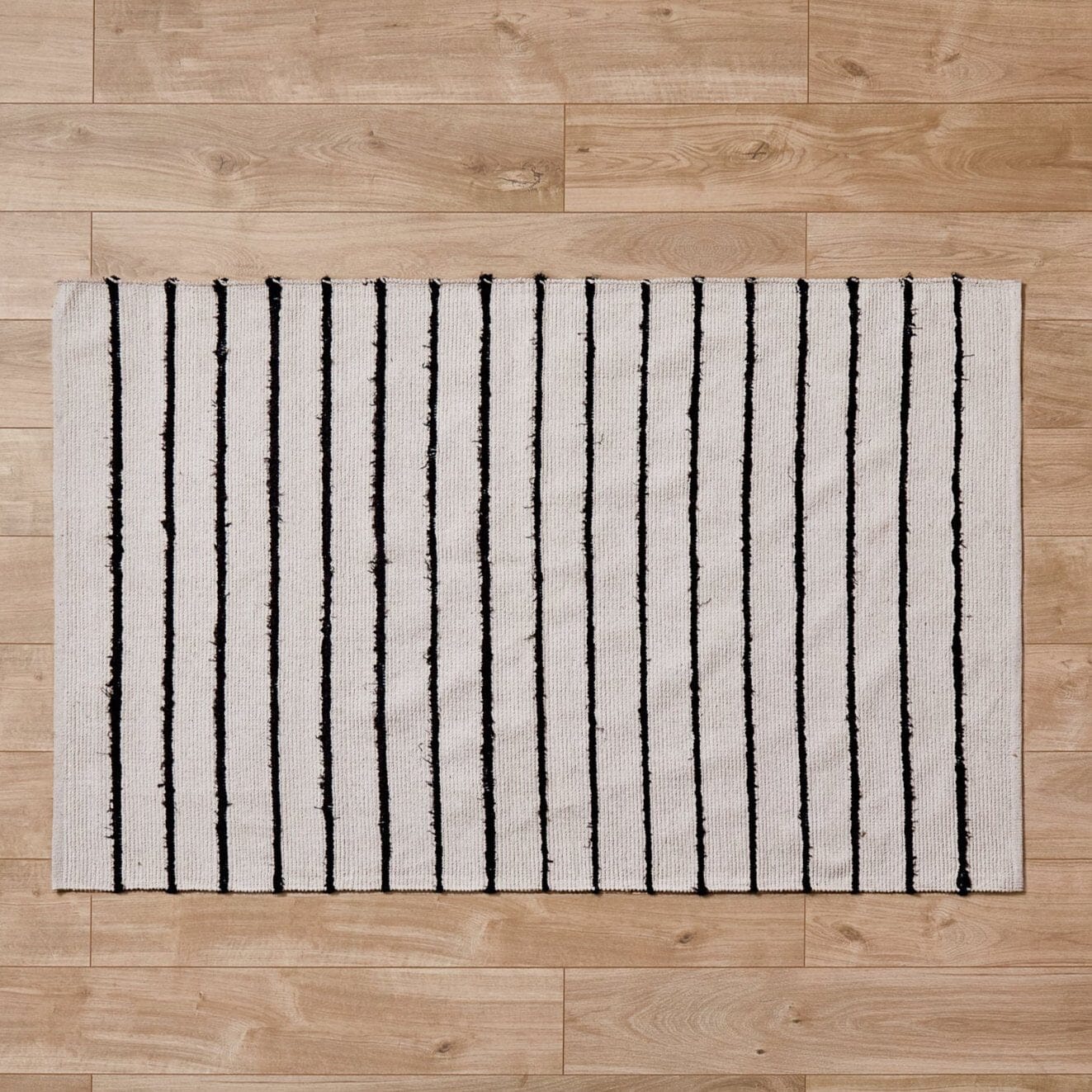 Evedon Black & Natural Striped Cotton Rug - 120 x 170cm - Image 2